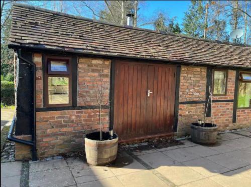 Boraston House | Cottage in Jacobean Farmhouse grounds