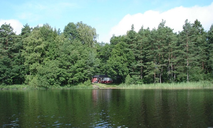 Markaryd House | Cottage right on the Loka Lake with its own boat