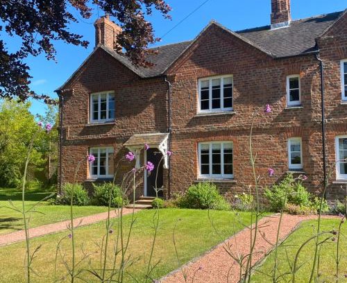 Wollerton House | Cottage with log burner and hot tub in shropshire