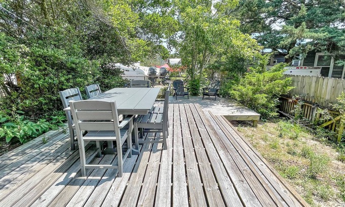 Ocracoke House | Court Jester: Pet friendly, fenced rear yard with deck.
