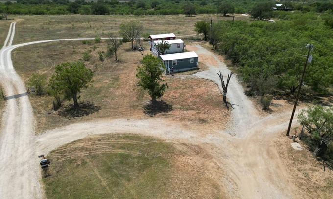 Richland Springs Cabin | Coyote Country White Cabin 1BR/1BA on a tall hill