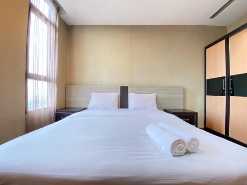 Dago Apartment | Cozy 2BR Apartment at Dago Butik By Travelio