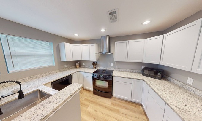 Gulfport House | Cozy 3-bedroom house with a bathroom in every room. 2 minutes from the beach!