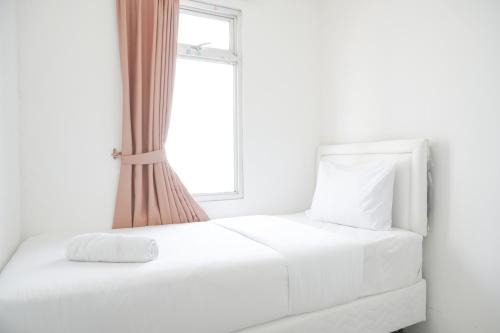 Pluit Apartment | Cozy and Comfort Living 2BR Green Bay Pluit Apartment By Travelio