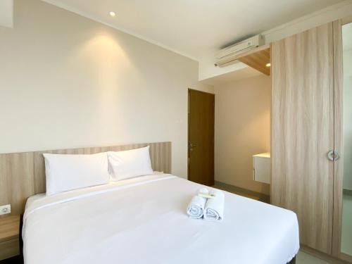 Cikarang Apartment | Cozy and Minimalist 2BR at 8th Floor The Oasis Cikarang Apartment By Travelio