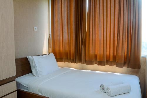Depok Apartment | Cozy and Minimalist Studio Apartment at Saladdin Mansion By Travelio