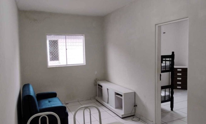 Canto do Forte Apartment | Cozy apartment with Wi-Fi and air conditioning in the bedroom,