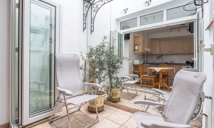 Nerja City Centre Apartment | Cozy Apartment with Sunny Patio, Barbecue, Wi-Fi & Air Conditioning