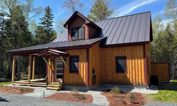 Mount Sunapee Cottage | Cozy cabin nestled in the woods, 5 minutes to Sunapee Mountain & lake!