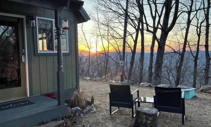 Great Cacapon Cottage | COZY CABIN. One room cabin with loft. Great sunsets & river view before Spring!