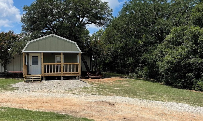 Azle Cabin | Cozy cabin with 1 bedroom and WiFi, AC & located on 40 acres with great views.