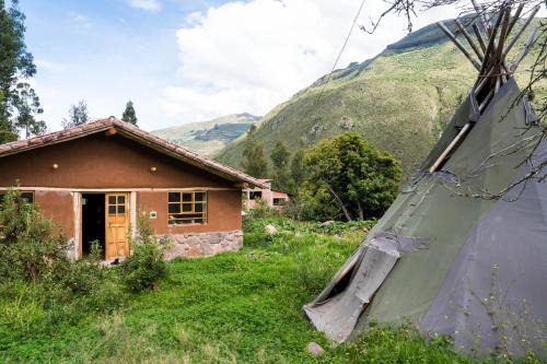 Huaran Ski Chalet | Cozy Casita in the Sacred Valley Breathtaking Waterfall and Mountains View