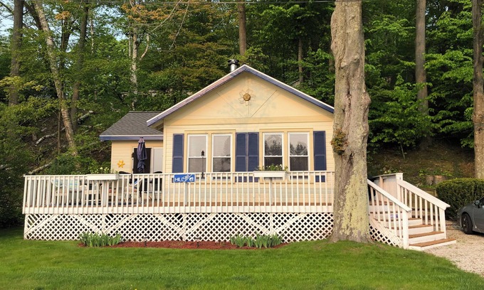 Ludington Cottage | Cozy cottage overlooking Hamlin Lake, a few minutes from downtown!