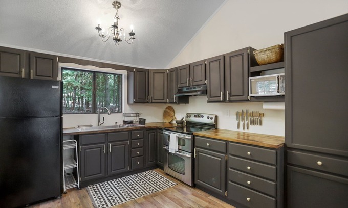 The Woods House | Cozy getaway in the woods of Hedgesville, WV. Pet friendly!
