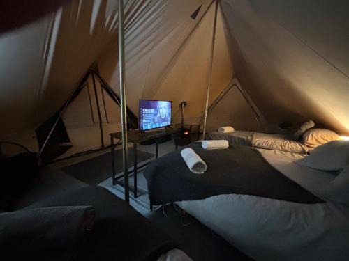 Bryngwran House | Cozy Hot Tent with Log Burner & Hot Tub Left Tent