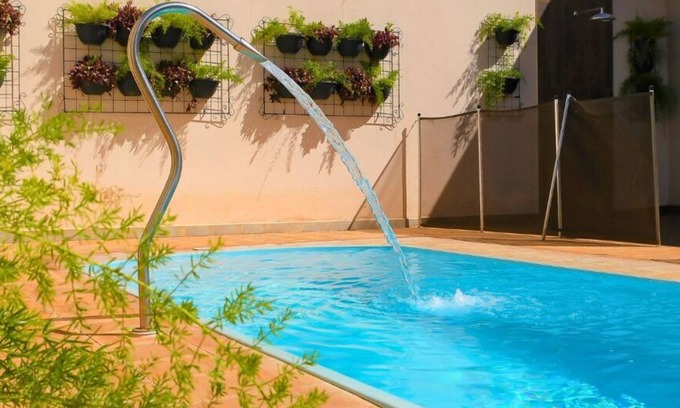 Olimpia House | Cozy house, a few minutes from Thermas dos Laranjais and Hot Beach parks