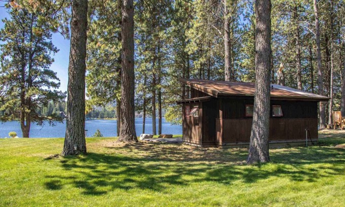 Sandpoint Cabin | Cozy Lakefront Cabin on Acreage with Dock, Disc Golf, Boat Launch & Lift