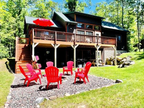 Stone Lake House | Cozy Lakefront Retreat with Game Room, Outdoor Living and Dock in Wisconsin