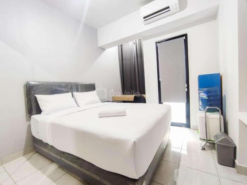Jatingaleh Apartment | Cozy Living Studio at The Alton Apartment By Travelio