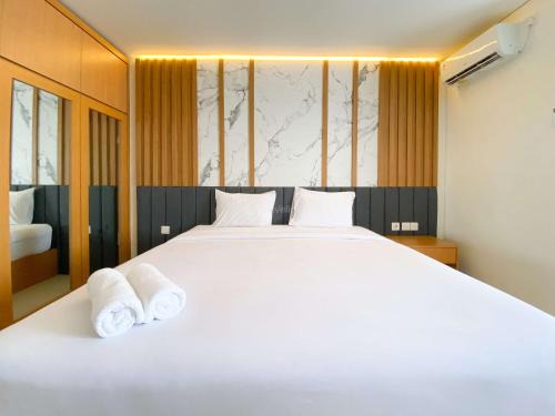 Semarang Apartment | Cozy Living Studio (No Kitchen) at Sentraland Semarang Apartment By Travelio