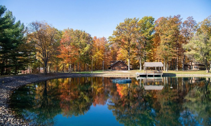 Dola Cabin | Cozy log cabin with pond nestled within 10 wooded acres. Accommodates up to 12!
