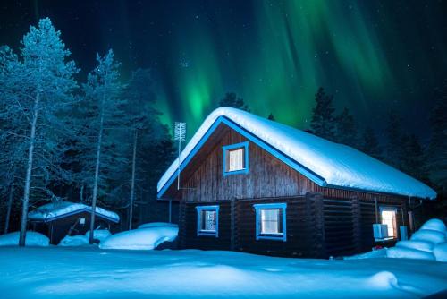 Muonio Ski Chalet | Cozy Log Cabin with Sauna and Wifi