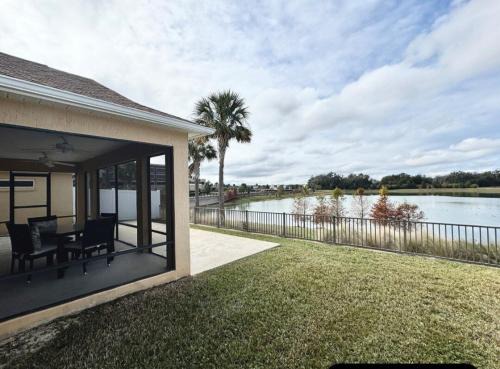 Wildwood House | Cozy Oasis in Prime Location with Sunset Lake View, Golf Cart and Bathtub