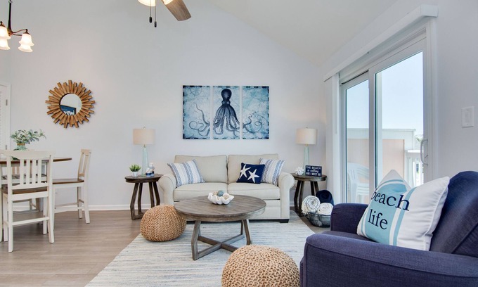 Emerald Isle Condo | Cozy oceanside studio, mere steps from the beach, and close to shops and dining