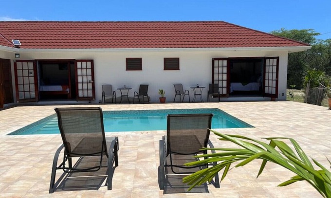 Treasure Beach Villa | Cozy Oceanview Room at Hidden Treasure Villas