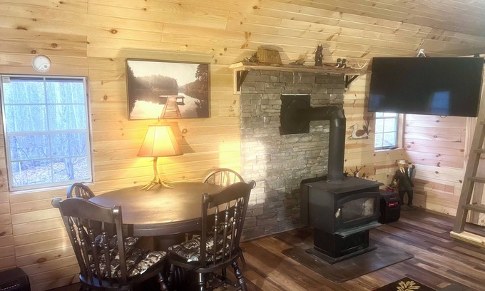Courthouse-Collins Settlement Cabin | Cozy one-bedroom cabin nestled in the woods beside Stonewall Jackson Resort.