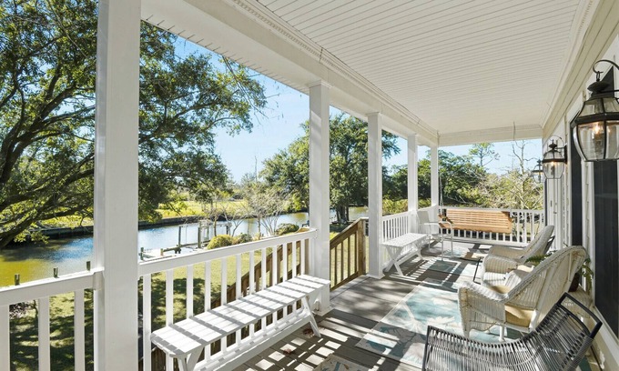 Henderson Point Cottage | Cozy Raised Cottage Overlooking Beautiful Bayou Mallini.
