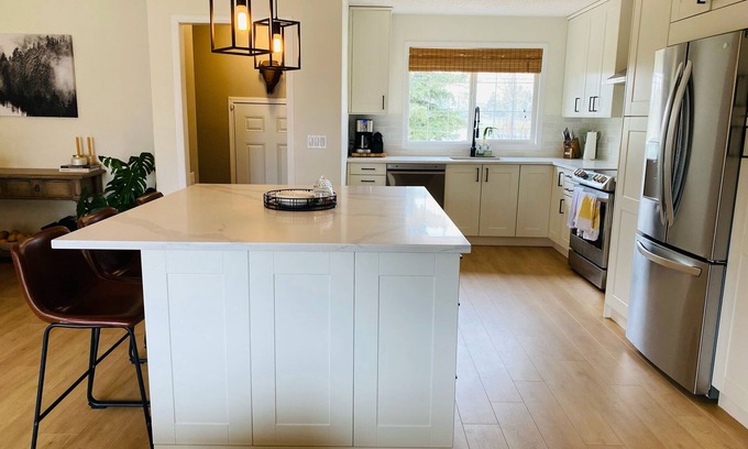 Southwest Calgary House | Cozy Renovated Bungalow Backing on Braeside Park