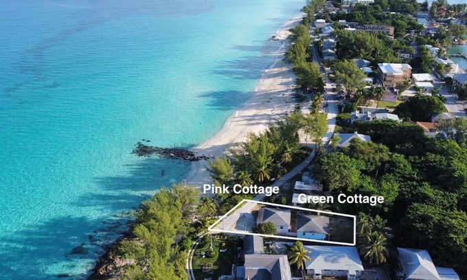 Alice Town House | COZY SEASIDE 2 BED/2 BATH BIMINI COTTAGE-BAY SIDE VIEW -soft green colored house