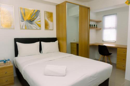 South Tangerang Apartment | Cozy Studio at Urbantown Serpong Apartment By Travelio