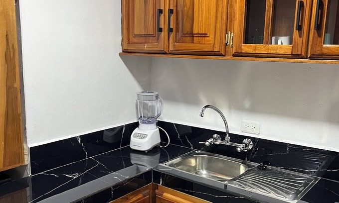 Banos de Agua Santa Apartment | Cozy suite with kitchen and private bathroom. 5 minutes from downtown