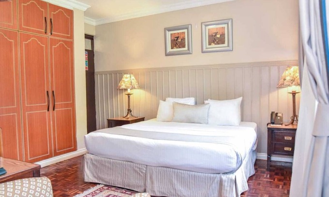 Muthaiga Hotel | Cozy Superior Room with AC & Fitness Access in Vibrant Nairobi