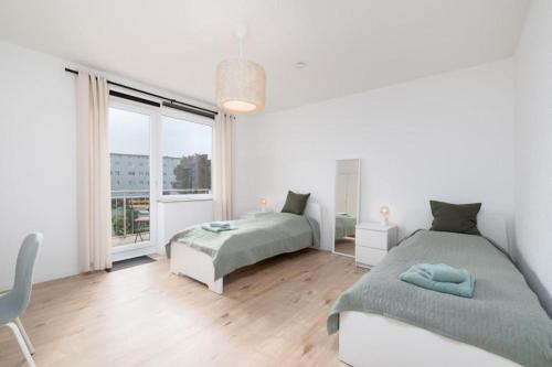 Stadtmitte Apartment | CREW BEDS - APARTMENT in Wolfsburg für 8 Personen- 110m2, 4 Zi, 8 Einzelbetten, 2 Bäder, Free Kaffee, WiFi & Parking - 24h CHECK IN