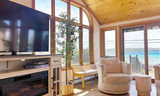 Lake Township House | Crystal Lake Hillside with Private Sandy Beach and Hot Tub!