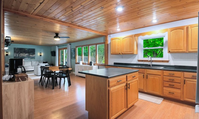 Paris House | Crystal Rapids Retreat: Cozy Up to Autumn's Beauty on the Muskegon River.