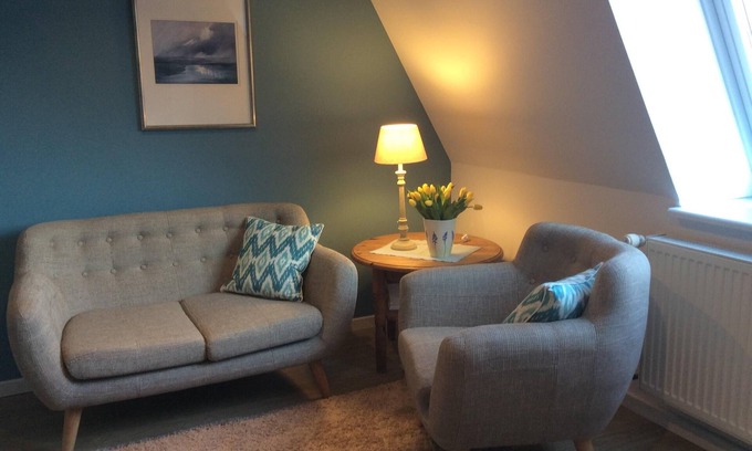 Wittduen Apartment | Cute one-room-apartment with sea view, balcony, close to the village with its sh