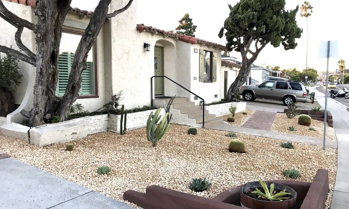 Crown Point House | Cute Spanish Bungalow - BBQ, Firepit, Bikes, Boards, and a Great Patio!