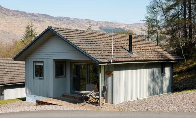 Crianlarich Ski Chalet | Deerstalker Lodge cozy lodge with wood burner