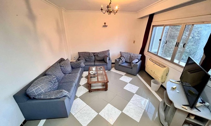 Taqseem Laselky Apartment | DEGLA OASIS: 2-Bedroom Studio with Private Balcony (central location)