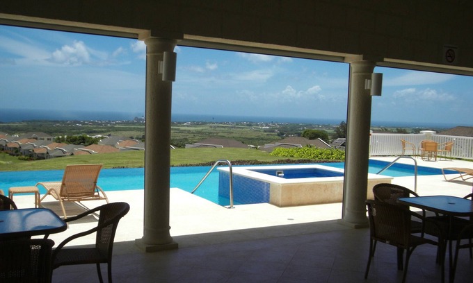 Vuemont Apartment | Delightful 2 Bed apt, sea & pool views to front & rear