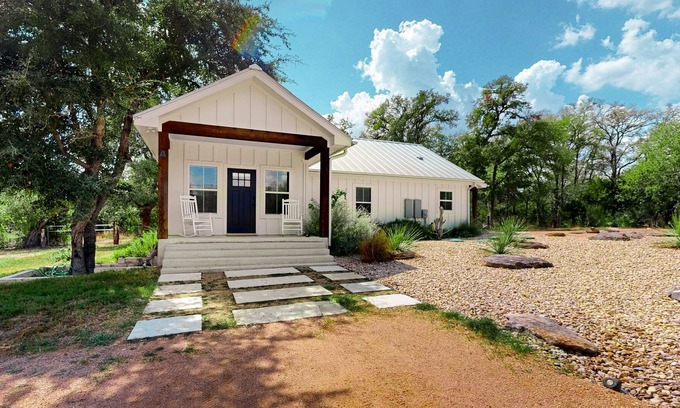 Kyle House | Delightful & modern duplex w/ patio, AC, & W/D - located near campus & shopping