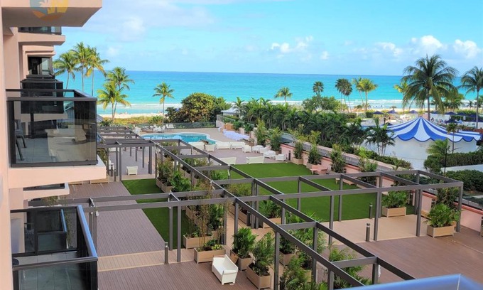 Mid Beach Apartment | Deluxe Beach Resort - HORA RENTALS