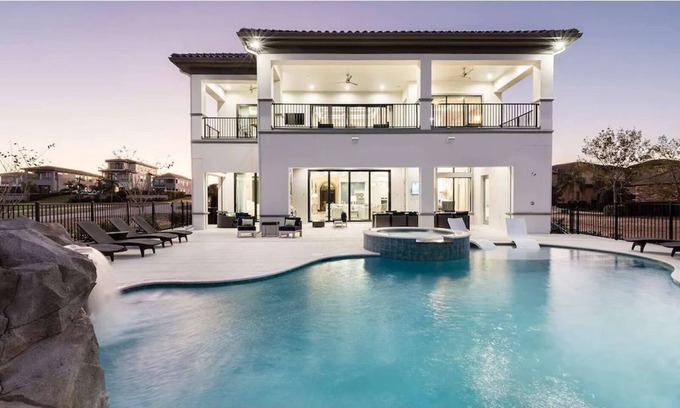 Reunion House | Deluxe Mansion with Swim up Bar and Pool Slide at Reunion - AUGUST DISCOUNT!