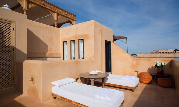 Bab Doukkala Villa | Deluxe Room Key Hook – Interior Courtyard View