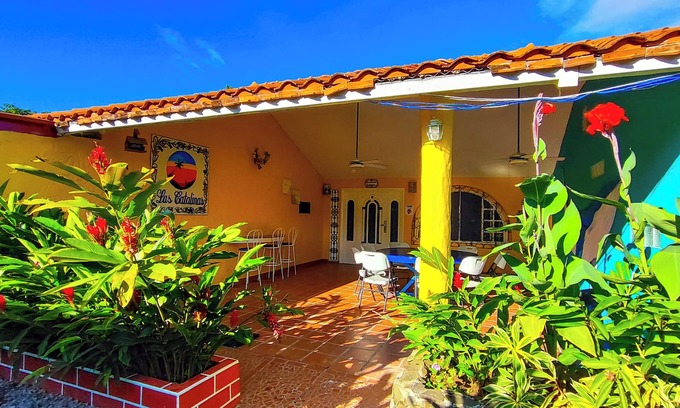 Playa Coronado House | Deluxe villa for 25 people, 3 bedrooms, 2 bathrooms, living room and terrace.