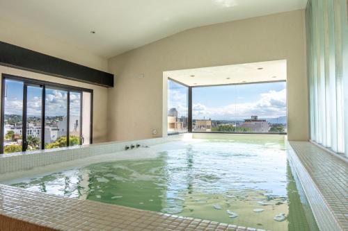 Villa Carlos Paz Apartment | Depto "Ideal" Céntrico, Pile Climat y Pile en Terraza, Cochera, Calef Central
